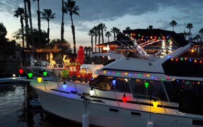boat decorated with Christmas lights